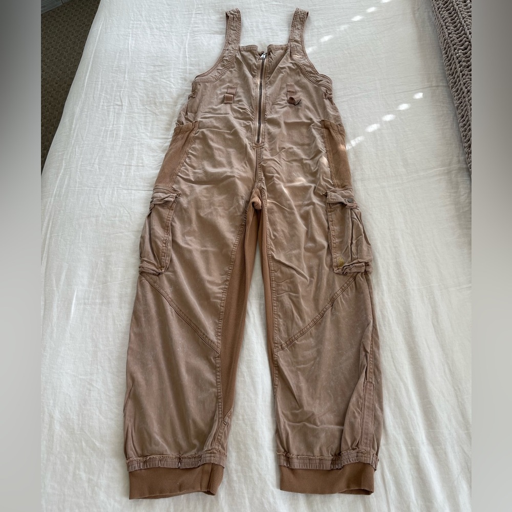 Free people, jump suit, sand shell/ tan, size Lg